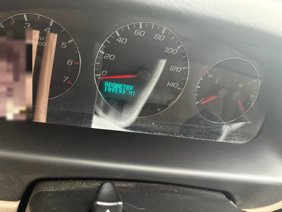Instrument cluster showing the coolant temperature gauge and an odometer reading over 189,000 miles